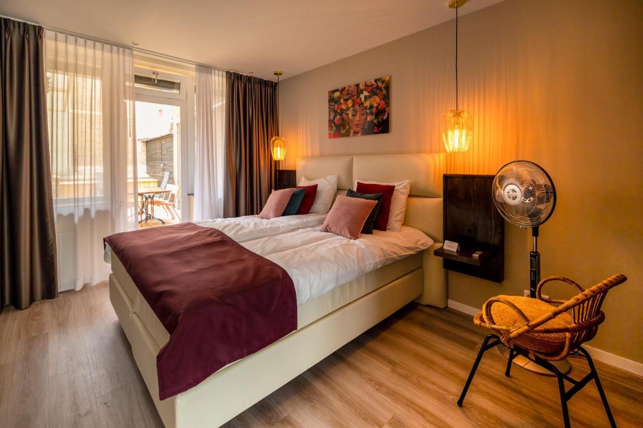 Suite mit Kingsize-Bett und Balkon