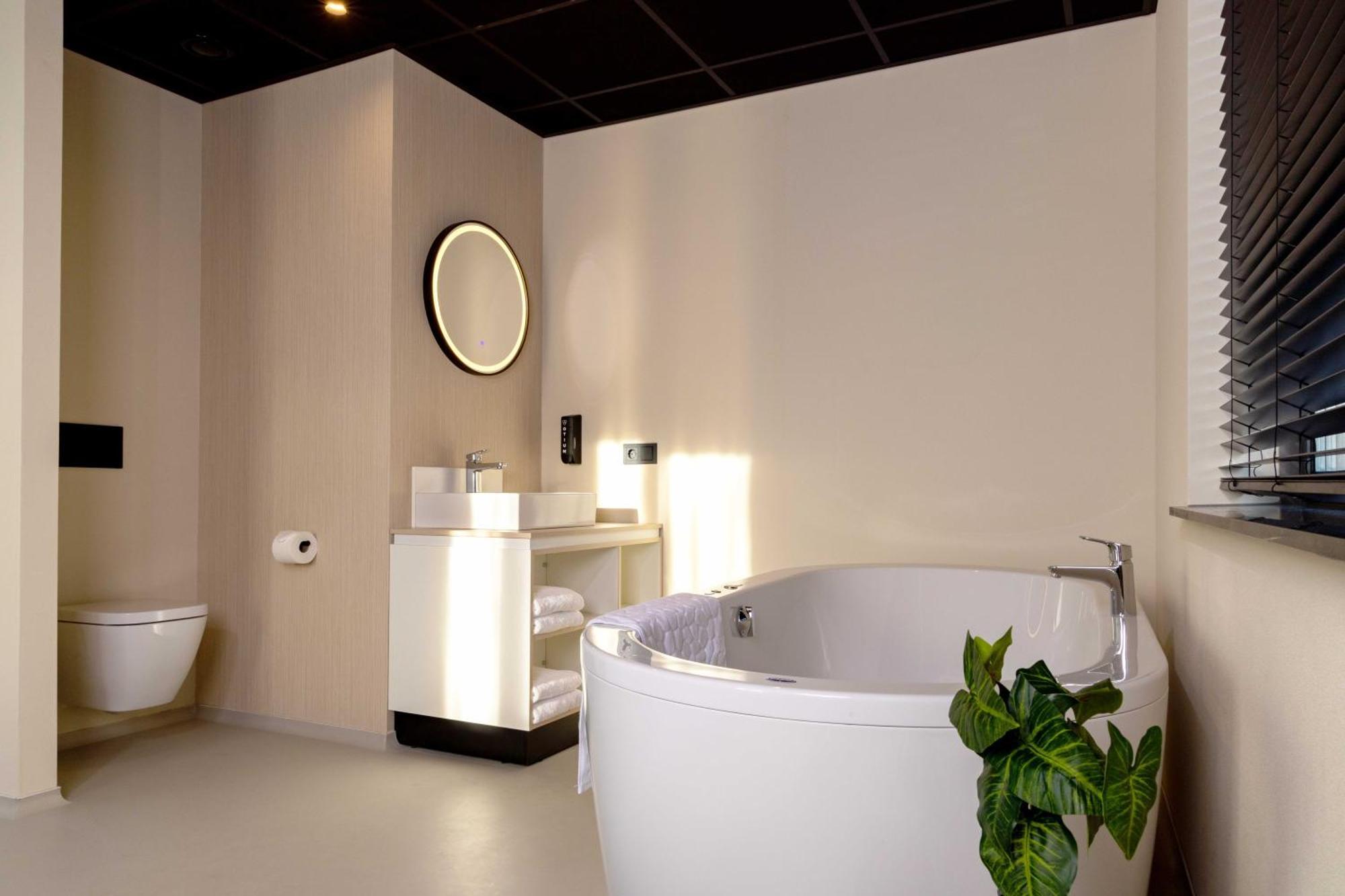 Kamer met Kingsize bed en Bubbelbad
