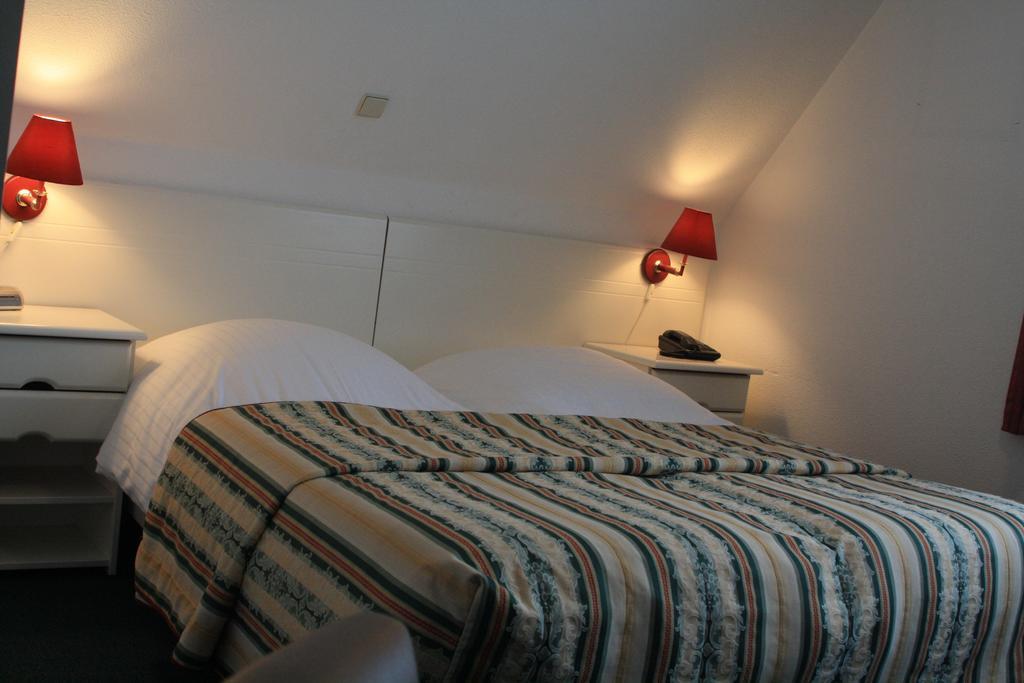 Dreibettzimmer mit Badewanne