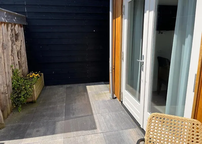 Luxe kamer Chambre Renard met eigen terras Zoutelande